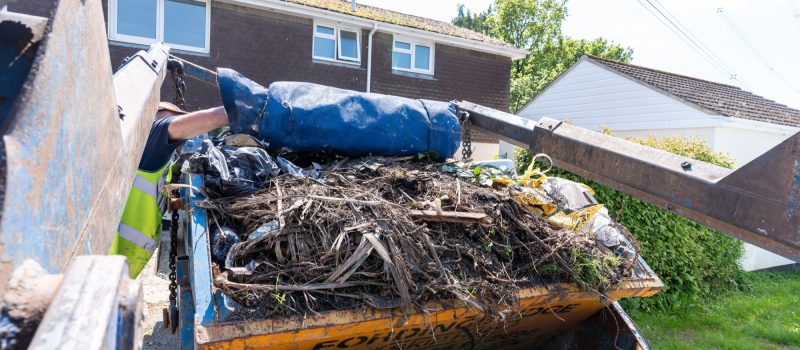 skip full of garden waste