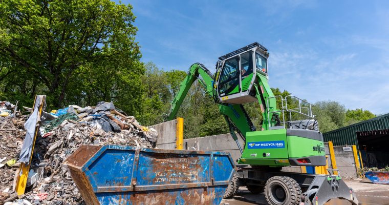 waste being scooped up