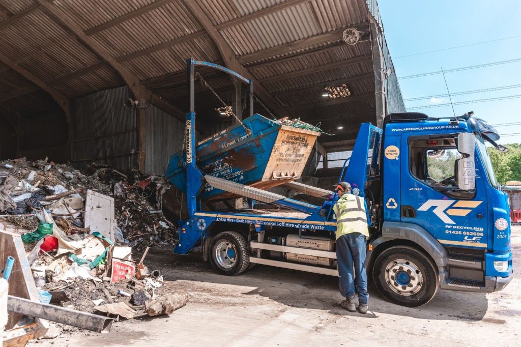a skip being emptied at a recycling centre