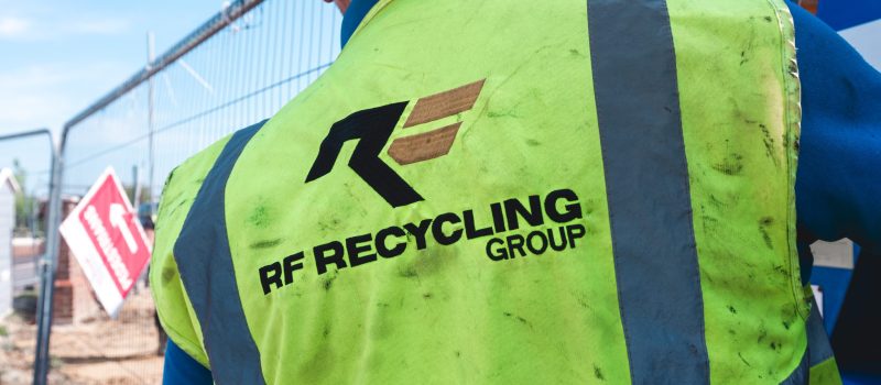 rf recycling logo on back of hi visibility vest