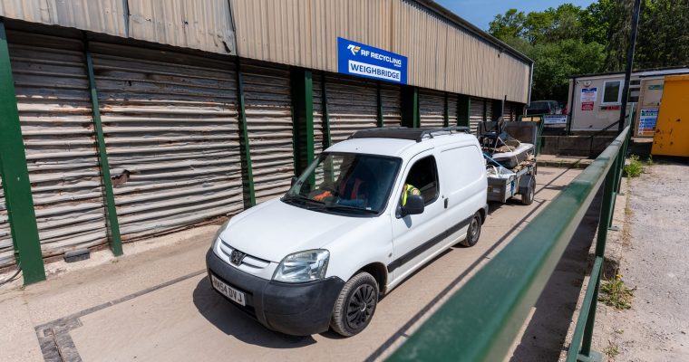 scrap metal being weighed