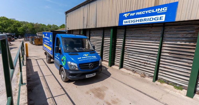 waste collection van on a weighbridge