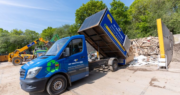 an RF waste collection van emptying waste responsibly at the RF recycling centre